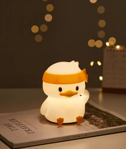 چراغ خواب سیلیکونی طرح اردک نشسته هدبند دار