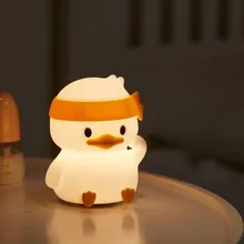 چراغ خواب سیلیکونی طرح اردک نشسته هدبند دار gallery2